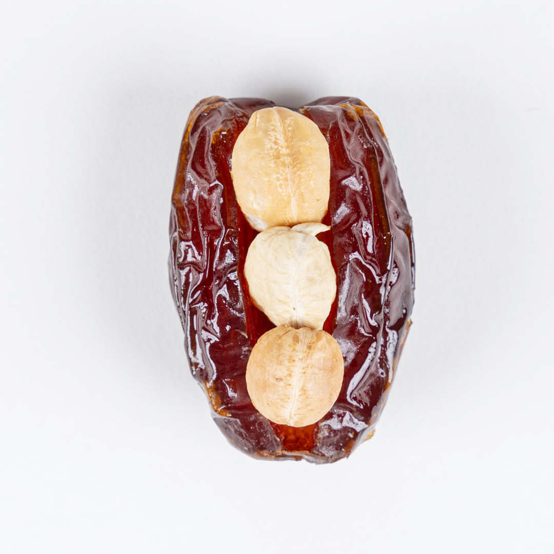 Unwrapped-stuffed-dates20-1.jpg Medjool Cashew 3 Pcs - Image 1